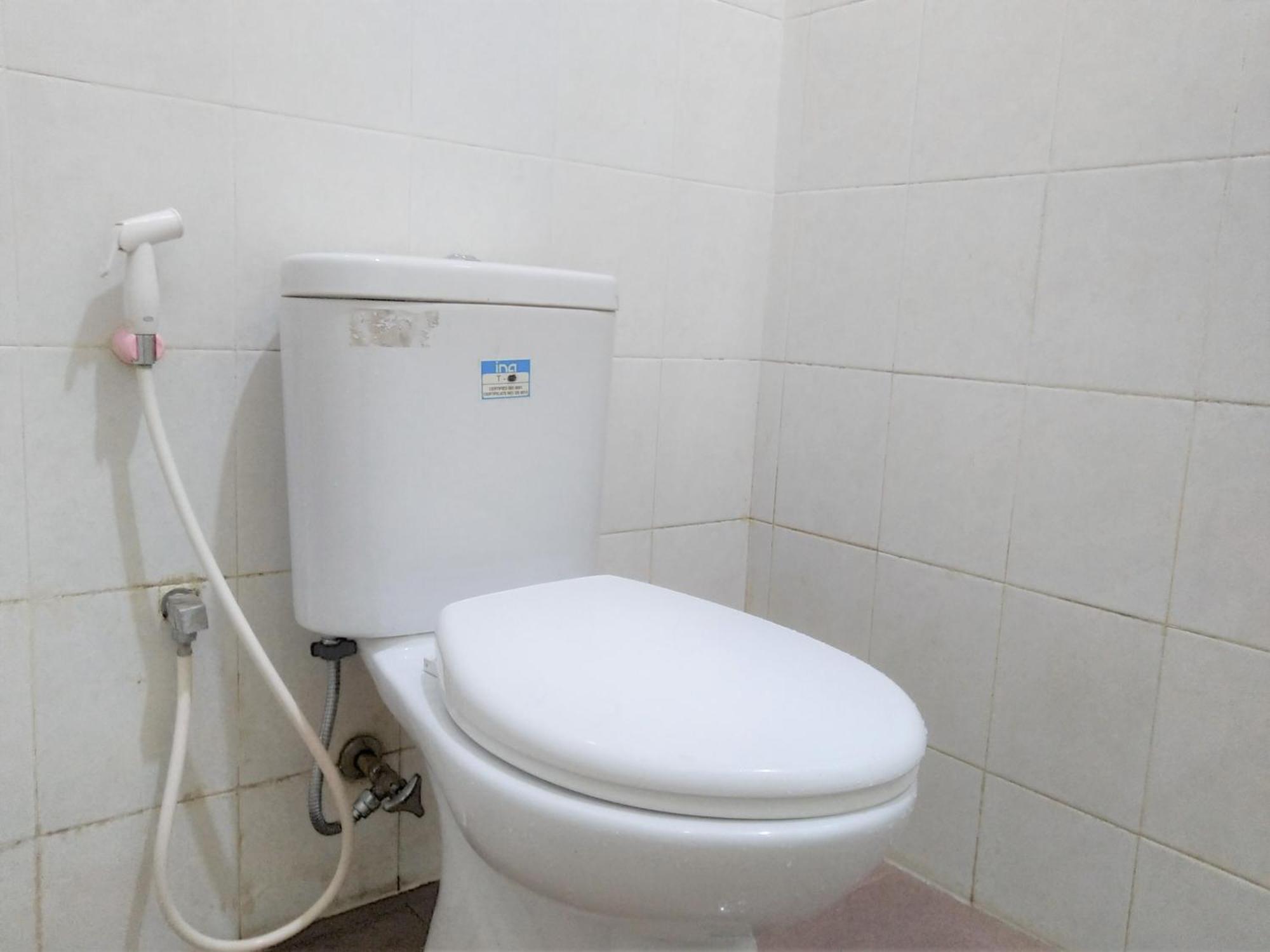 Hotel Pekalongan Syariah RedPartner Ruang foto